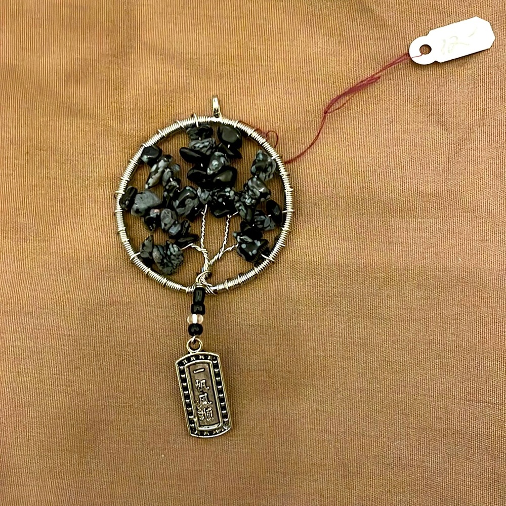 Handcrafted Tree of life pendant. Black and gray rocks.